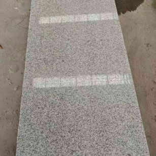 眉山芝麻白光面毛板